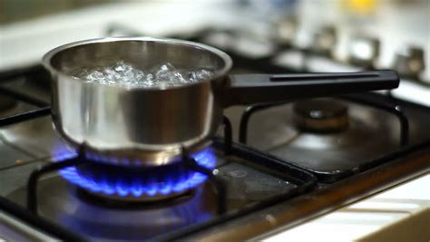 Boiling Water In The Can On Natural Blue Gas Kitchen Soft Focus Hd