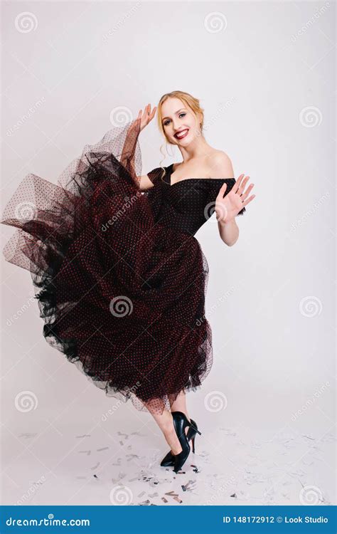 Beautiful Blonde Woman Spinning In Dance Twirling Skirt Having Fun At Party Enjoying Shoot In