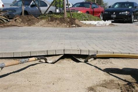 On a new installation of thick. Thinking about using polymeric sand on your pavers? Read ...