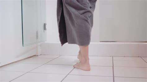 Attractive Woman Drops Her Towel As She Enters The Shower Stock Footage