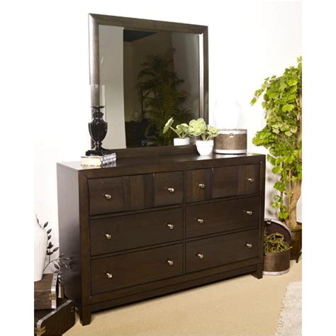 A mirrored dresser or vanity dresser is the epitome of functional style, thanks to its combination of drawers and a dresser mirror. B582-31 Ashley Furniture Chanella - Dark Brown Bedroom Dresser