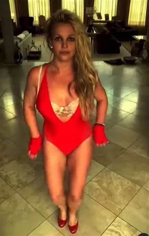 Britney Spears Flashes Lace Bra Under Plunging Red Bodysuit In Racy Dance Video Big World Tale