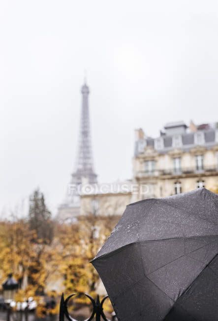Paris France Black Umbrella Under The Rain With The Eiffel Tower In