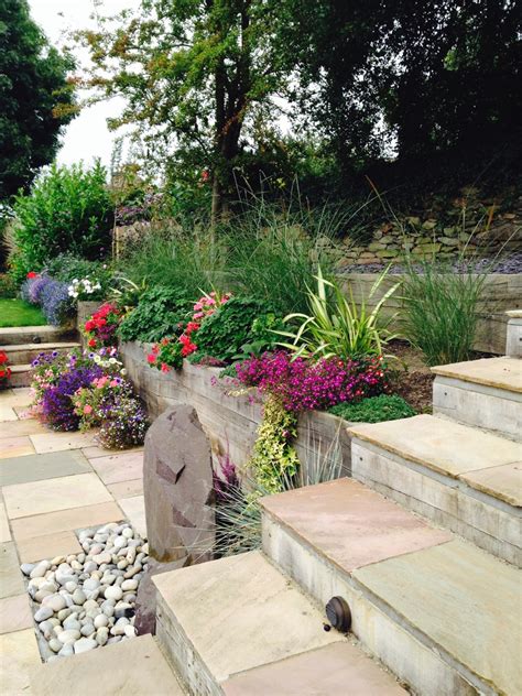 Sloping uphill & sloping downhill, design tips. Steeply Sloping Garden Design & Planting Services | Garden ...