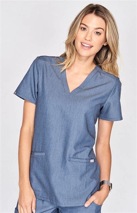 with stretch fabric and three pockets the women s casma scrub top is ready for busy days part