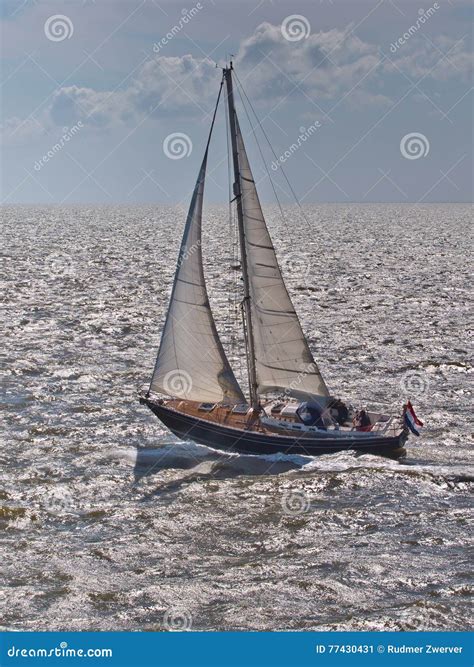 Fast Sailing Boat Racing In Stormy Weather In The Netherlands Stock