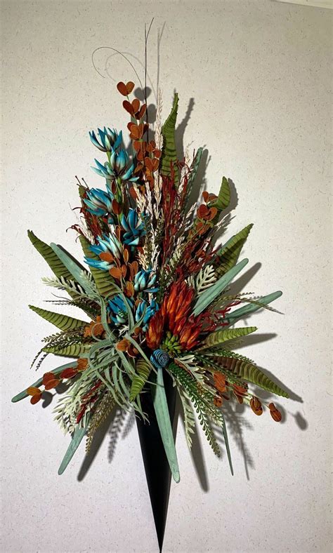 Check out our dark teal flowers selection for the very best in unique or custom, handmade pieces from our shops. Wall Sconce Floral Arrangement, Rustic and Teal, Silk ...
