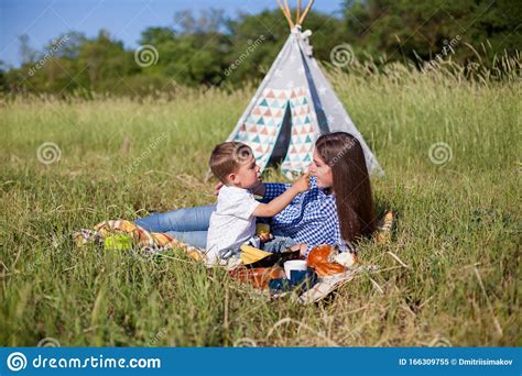 Beautiful Mom With Her Son On A Picnic Rest In Nature Stock Image Image Of Female Outdoor