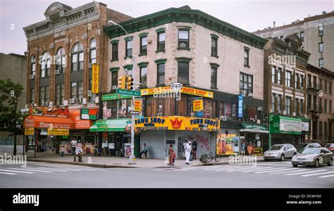 A Street Corner On East 125th Street In Harlem In New York Is Ripe For