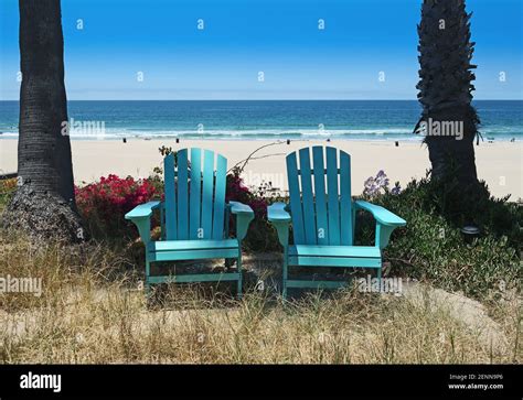 Blue Adirondack Chairs At Beach Stock Photo Alamy