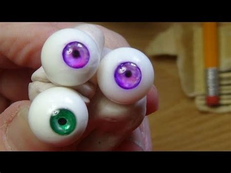 I also used scraps of black yarn to embroider the top edges. How to make beautiful glass eyes for your dolls - YouTube
