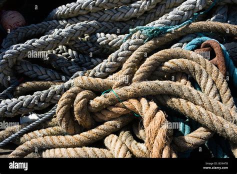 A Collection Of Tangled Ropes At A Harbour Stock Photo Alamy