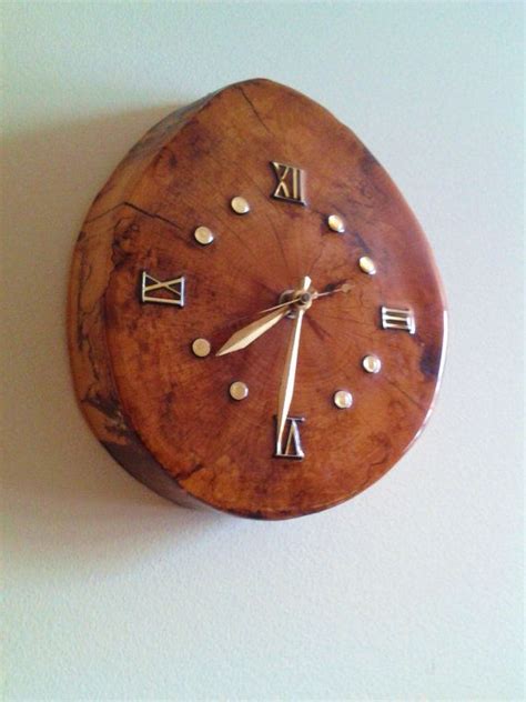 Jun 30, 2021 · gear train: Modern minimalist tree trunk wall clock golden hands and ...