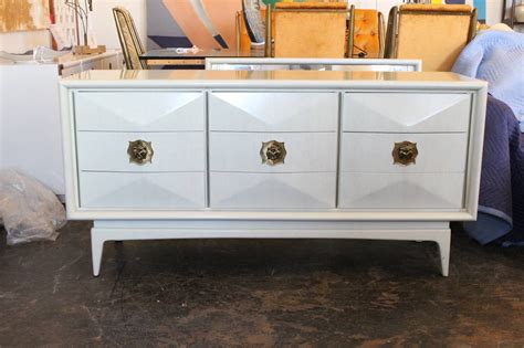 Diamond patterned inlay marble veneer tops on dresser Diamond Front Dresser by United Furniture at 1stdibs