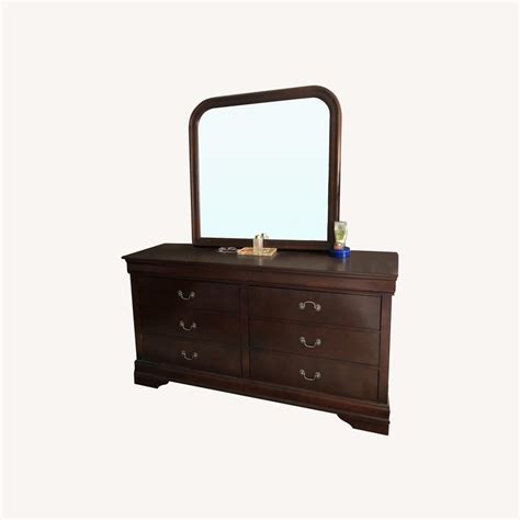 Art Van Wooden Dresser with Mirror - AptDeco Van der jagt, i deliver as an artist, illustrator, painter and musician to create spectacular digital artworks which come to life in an instant.