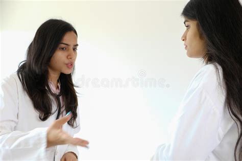 Female South Asian Doctors From India Talking To Each Other Stock Image Image Of Uniform