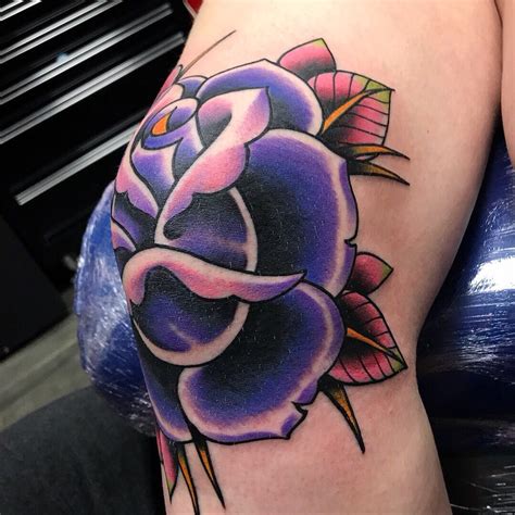 Purple rose tattoo designs have gone viral with their flourishing look. TLC Tattoo on Twitter: "Traditional purple rose on the ...