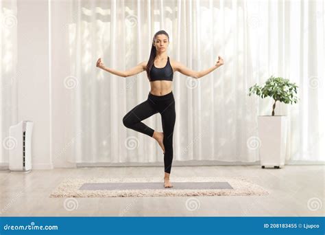 Young Woman Practicing Yoga At Home Stock Image Image Of Activity Model 208183455