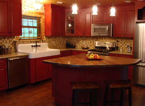Installing a new set of cabinets that look freshly painted would really help to freshen up my kitchen. Custom Kitchen- Painted Red Cabinets with Distressing and Wear through finish. Black Walnut ...