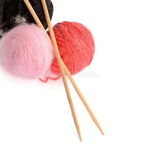 Balls Of Wool And Knitting Needles Isolated On White Background Stock