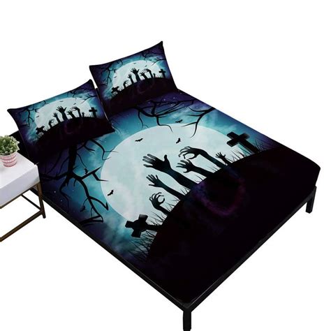 A Bed With Two Pillows On It In Front Of A Night Sky And Tree Silhouettes