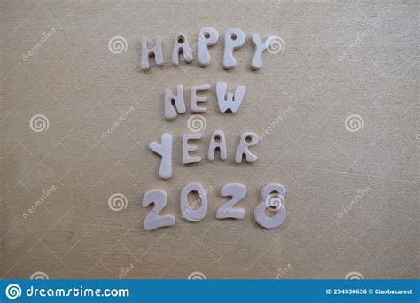 Happy New Year 2028 Creative Message Composed With Wooden Letters