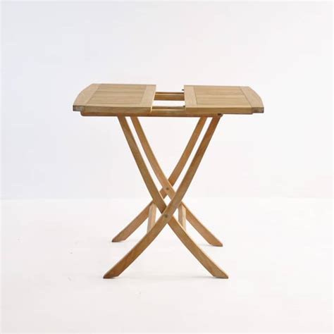 The one that is showed in the listing is teak. Square Teak Folding Bag Table | Patio Dining Furniture | Design Warehouse