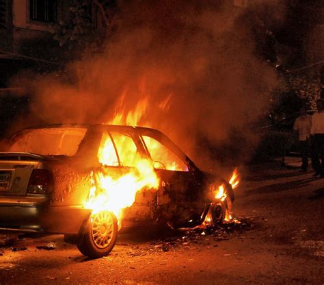 Noida A Car In Flames After It Catches Fire In Noida On Wednesday Night