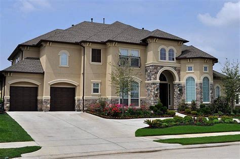 Cool curb appeal comes in many shades of the rainbow. Stucco Colors Dark Stone Houses - House Plans | #98397