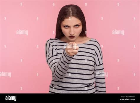 are you ready portrait of angry displeased bossy woman in striped sweatshirt scolding for