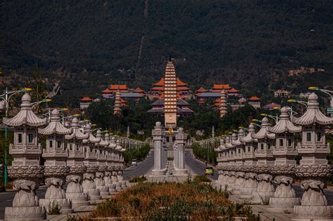 Browse Free Hd Images Of Symmetrical Statues Lining A City Street