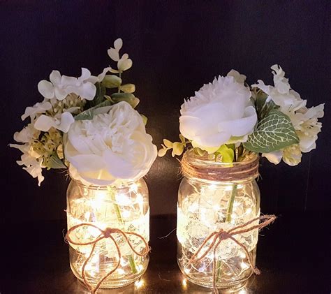 Mason Jar Fairy Lights And Flowers Mason Jar Fairy Lights Wedding Centerpieces Mason Jars