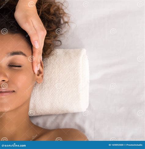 Relaxed Woman Receiving Cosmetology Face Massage Crop Stock Photo Image Of Adult Health