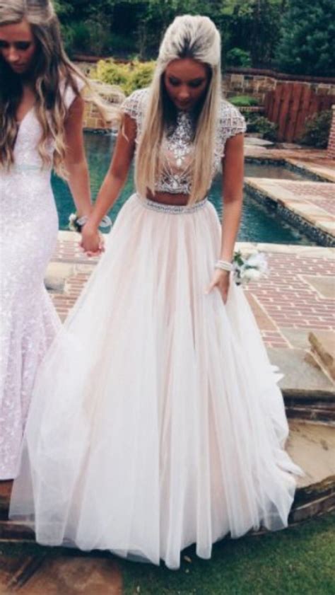 Apply a styling product to damp hair to boost volume and control texture. dress, prom dress, two piece dress set, white, white dress ...
