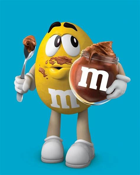 yellow mandm character with chocolate pudding spoon