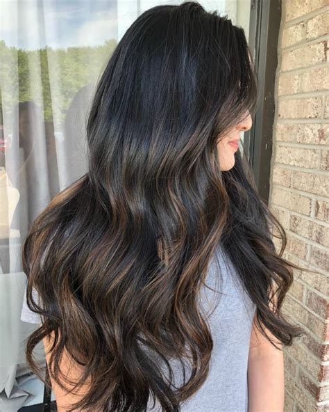 Black long shiny hair hairstyle with dark highlights. A Fabulous Long Black And Brown Hairstyle Ideas With ...