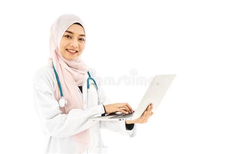 Beautiful Young Muslim Woman Doctor Wearing Doctor Uniform And Hijab