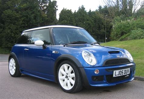 Bmw Mini Cooper In Blue With White Stripes A Storm Is Brewing Artofit