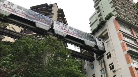 Monorail Train Passes THROUGH Residential Building In China S Chongqing