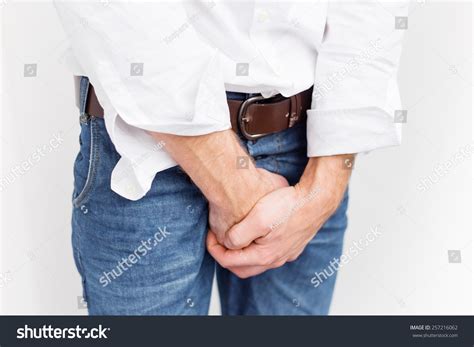 Man Covering His Crotch With Both Hands Stock Photo 257216062