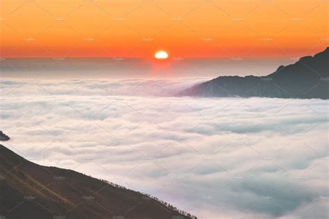 Sunrise Over Mountains Clouds Aerial Nature Stock Photos Creative