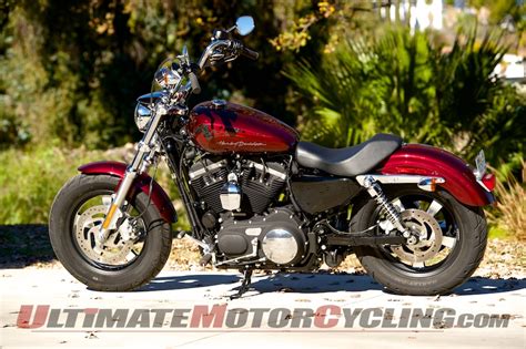 The 1200cc evolution® engine on the 1200 custom features black rocker box covers, black and chrome oval air cleaner cover, and a black and chrome timer cover. 2014 Harley-Davidson Sportster 1200 Custom H-D1 | Review