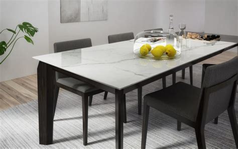 These beautiful solid top and extension tables are available in rectangular, round, square & oval shapes. Sleek Magnolia Extension Dining Table by Joel Dupras - Mobilia