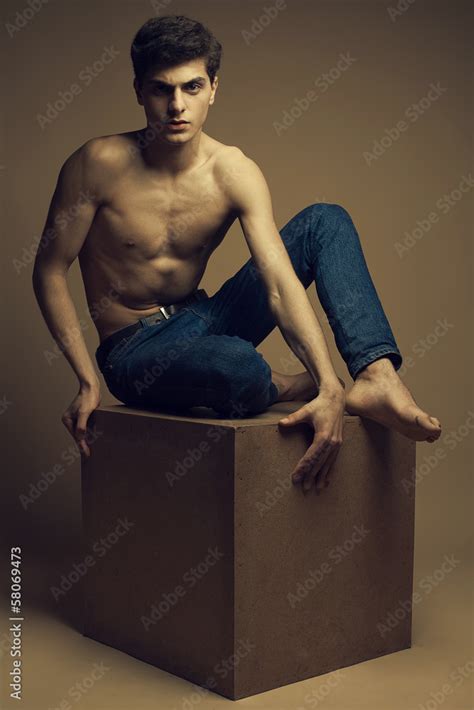 Blue Jeans Concept Handsome Muscular Male Model In Blue Jeans Stock