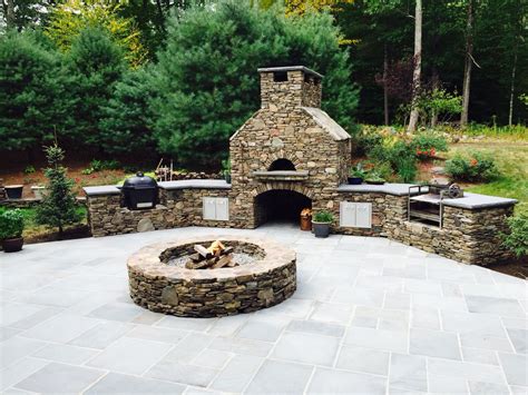 Outdoor Kitchen With Pizza Oven Fire Pit Smoker And Rotisserie
