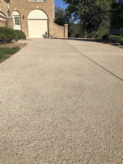 This Beautifully Resurfaced Concrete Driveway Complements The Overall