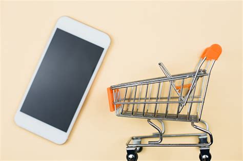 Shopping Cart With Smartphone Stock Photo Download Image Now Istock