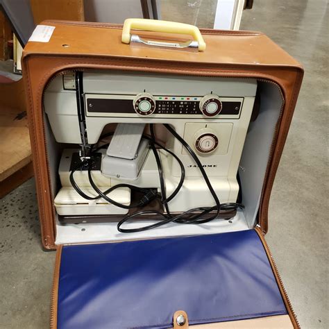 Janome Leather Cased Sewing Machine Model 657 Big Valley Auction