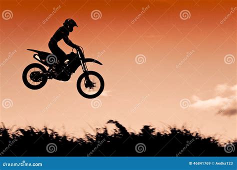 Motocross Action With Sunset Background Stock Image Image Of Flying
