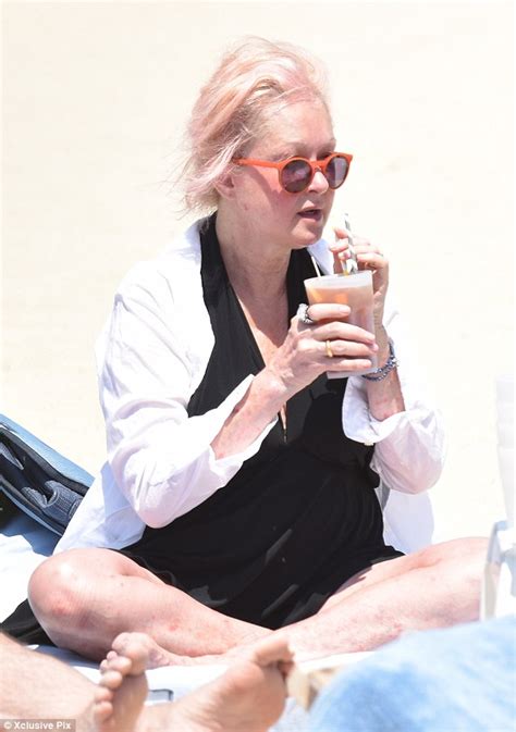 Pink Haired Cyndi Lauper 61 Puts On A Leggy Display In A Little Black Swimsuit As She Takes